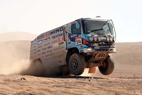 Car 2 speeding along the wheel ruts in the dune.